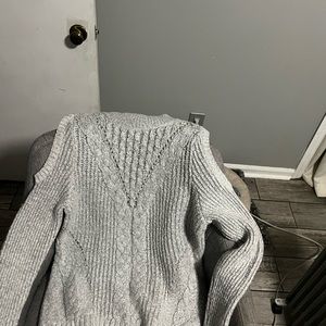 Maurice’s grey sweater